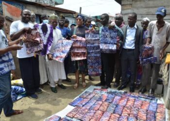1.Chairman of  National Union of Textile Garment Tailoring Workers of Nigeria (NUTGTWN) Kampala Sector,Comrade Ibrahim Lawal, Executive Chairman Itire-Ikate LCDA Hon.Hammed Apatira and Olori Aderonke Ademiluyi Ogunwusi exhibiting the Adire at the production site of the union in Lagos.