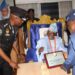 The Ag. IG, Kayode Egbetokun listening to Oba Sen. Lekan Balogun CFR, Olubadan of Ibadanland after presenting him a commemorative plaque received on behalf of Oba Balogun by his 'Baba Kekere', Sen. Kola Balogun during the visit of the police boss to the monarch in his Alarere residence.