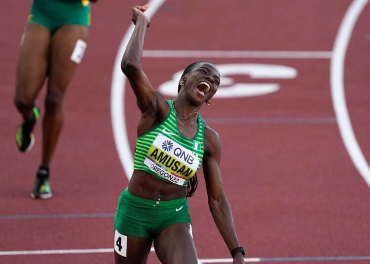 Tobi Amusan, of Nigeria, celebrates winning the women's 100-meter hurdles final at the World Athletics Championships on Sunday, July 24, 2022, in Eugene, Ore. (AP Photo/Gregory Bull)