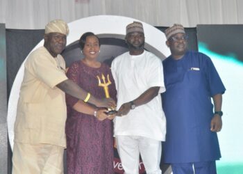 L-R: Dr Femi Badejo, CEO, Global Trade Policy (left), presenting the award for Telecoms Brand of the Year to Glo officials, Ms Catherine Bomett, Director, Customer Care; Mr Remi Makinde, Group CTO, Rollout; and Mr Zakari Usman, Head Enterprise Business Group, at the Marketing Edge awards at Podium Event Centre, Lekki, Lagos on Saturday.