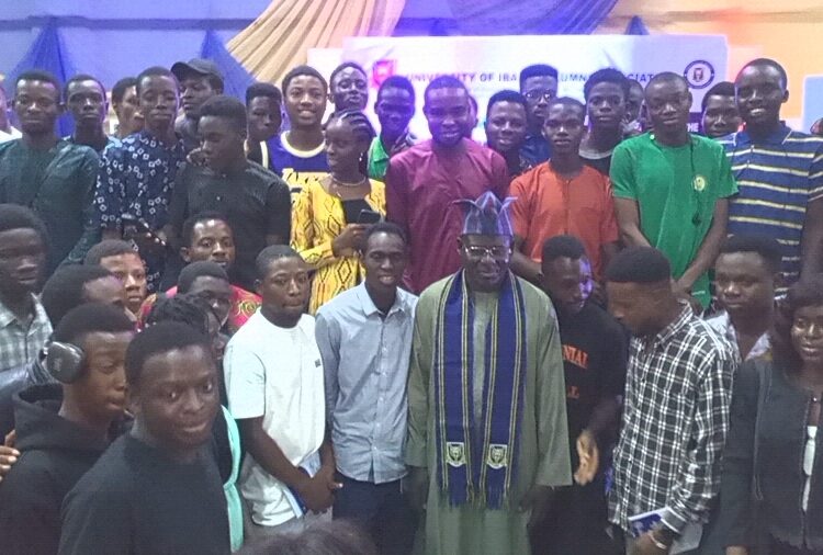 Lt Gen Buratai in a group picture with some students of the University of Ibadan after the paper presentation
