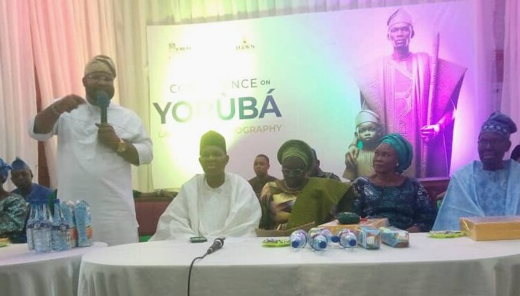 From left standing to right is Co-ordinator, Wikipedia Yoruba, Mr. Olatunde Isaac, Co-ordinator Yoruba World Centre, Mr. Alao Adedayo, Ogun State Deputy Governor, Mrs. Naimot Oyedele, and Emeritus Prof. Ayo Bamgbose.