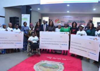 Some of the beneficiaries with their cheques