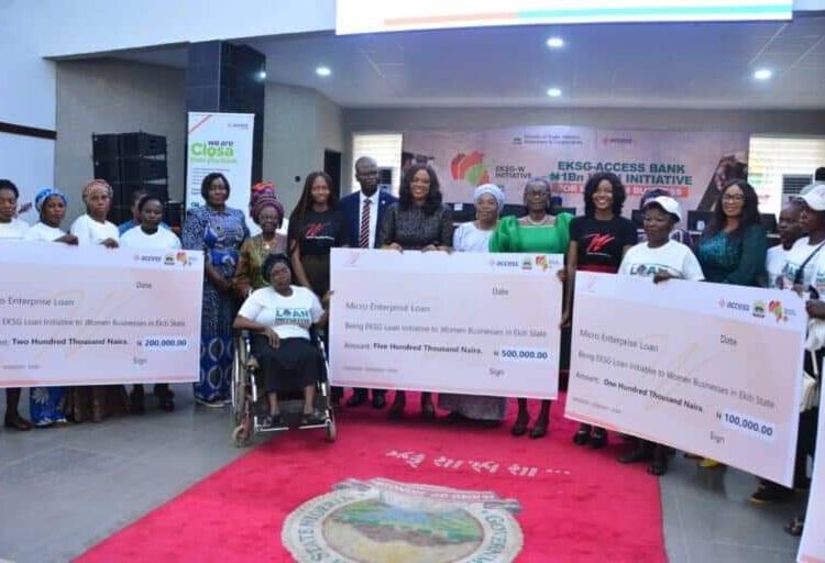 Some of the beneficiaries with their cheques