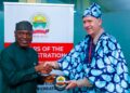 Ekiti State Governor Biodun Oyebanji, presenting award plaque to Marcel Leijzer, Manager of Technical Cooperation at the United Nations Tourism (UN Tourism) during his visit to the state