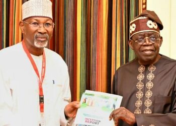 Prof. Jega submitting the Livestock Reforms Committee’s report to President Tinubu