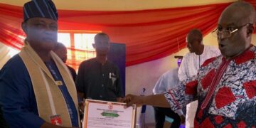 Re-elected president of
 Ibadan Christ Apostolic Grammar School Old Boys Association (ICAGSOBA) receiving certificate of returns