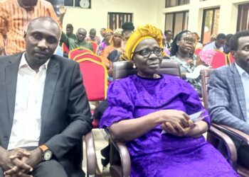 Mrs Babalola widow of the late Olusakin Babalola flanked by her  Sons , Seye and Yinka