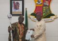 Governor Seyi Makinde presenting instrument of office to prince Akeem Abimbola Owoade, the new Alaafin of Oyo