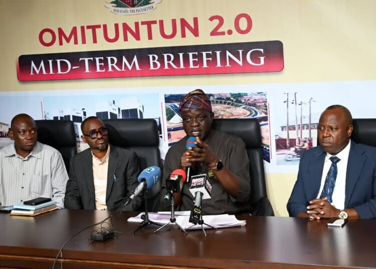 IMG-20250703-WA0076 - National Insight News LANDS: Oyo State Commissioner for Lands, Housing and Urban Development, Mr Williams Akin-Funmilayo (second right); briefing the pressmen, while the Director, Physical Development Control, Mr Seun Raji (second left); Director, Lands Management, Mr Ayodele Adeosun (left) and Special Adviser on Media/Chief Press Secretary to the Oyo State Governor, Dr Sulaimon Olanrewaju look on, during the Omituntun 2.0 Mid-Term Inter Ministerial Press Briefing of the Ministry, held at Governor's Office Media Conference Room, Secretariat, Ibadan. PHOTO: Oyo Gov's Media Unit.