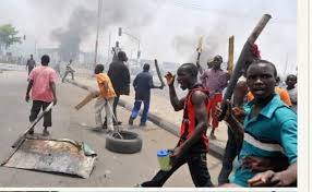 Image of youths staging a protest - National Insight News Image of youths staging a protest