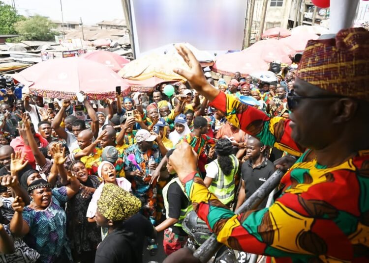 IMG-20260218-WA0009 - National Insight News Governor Seyi Makinde acknowledging cheers from the people during the parade organized as part of Oyo State’s golden jubilee celebration.