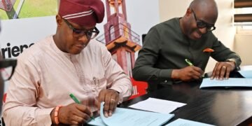 Director General, Oyo State Investment and Public Private Partnership Agency (OYSIPA), Mr. Olatilewa Folami (left) and the Managing Director, SystemSpecs Whatadeal Limited, Mr Obafela Bank-Olemoh, during the Official Concessionaire of Bower's Tower, Ibadan, held at the Conference Room, Ministry of Culture and Tourism, Secretariat, Ibadan.