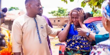 Adegbite consoling one of the victim's relative